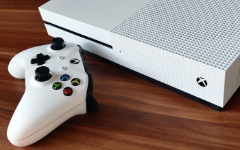 You are faced with a choice — A PS4 or an Xbox One — Which way to go?